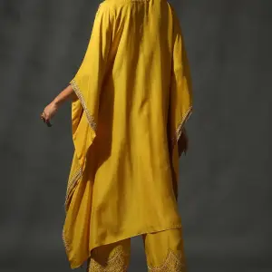 Buy Aastha Jain Yellow Silk Sequins Kaftan Set For Women Available online at ScrollnShops Yellow / L